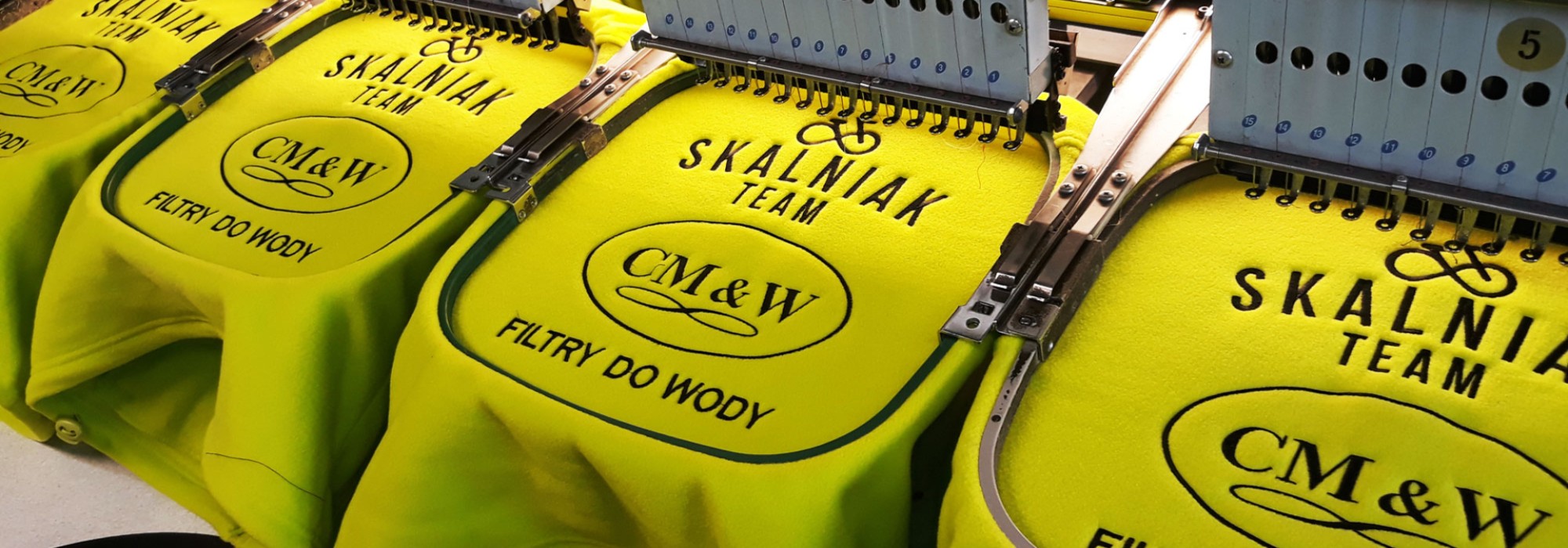 Polary z haftem firmowym